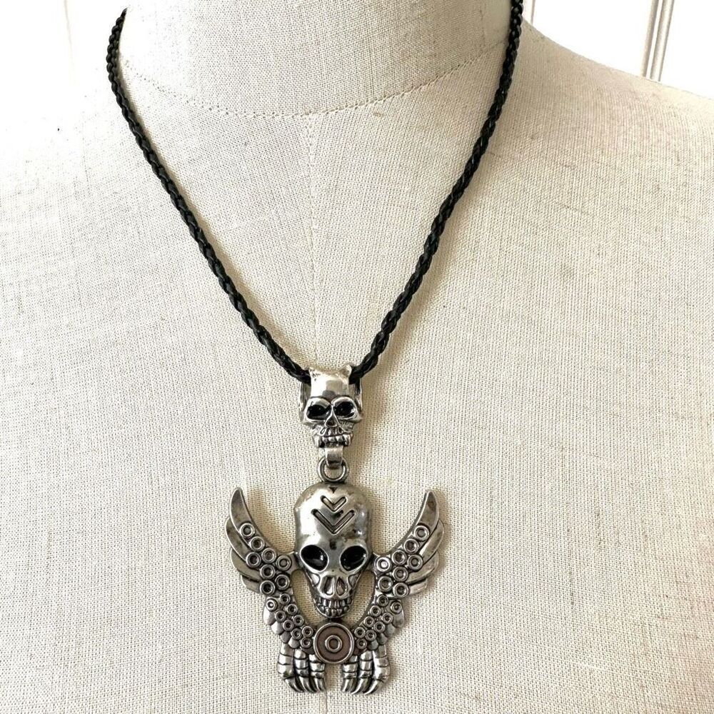 Silver tone Winged skull pendant necklace on black cord